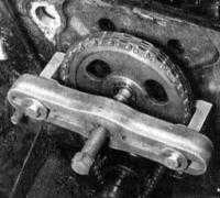  Снятие, проверка состояния и установка крышки распределительной  цепи, самой цепи и ее звездочек Jeep Grand Cherokee